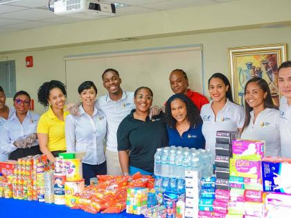 Members of the Caribbean Assurance Brokers team, including (from left) Toni Nishell Miller, divisional administrator; Donna Brown, chief operations officer; Sheba Grant, chief accountant; Moniesha Bryan, assistant marketing manager; Treves Allen, claims as