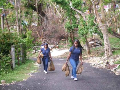 Intcomex Jamaica brought early Christmas cheer to over 100 families in Cave District, Westmoreland, on December 13, as part of its six-month adoption of the community to assist with post-Hurricane Melissa recovery.  