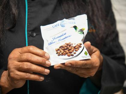 Chef Jackie Tyson with Café Blue’s chocolate-covered coffee beans.