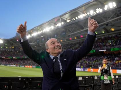 
Fiorentina President Rocco Commisso gestures to club fans from the field ahead of the Conference League final football match against Olympiacos FC at OPAP Arena in Athens, Greece, on May 29, 2024. 