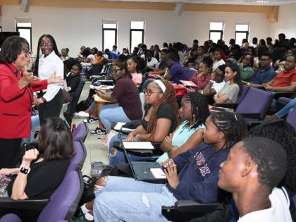 Minister of State in the Ministry of Justice and Constitutional Affairs, Marisa Dalrymple-Philibert, addresses first-year law students pursuing constitutional law at the Faculty of Law, University of the West Indies, Mona, on Monday.