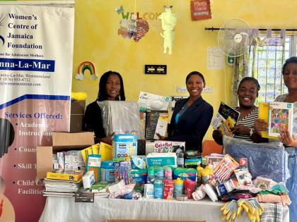 From left: Mellisa Boothe-Anderson, centre manager; Ashley Simms, regional public relations manager (Sandals Negril); Stacey-Ann Reid, counsellor; and Claudia Lindsay posing with a portion of the donations made by the Sandals Foundation, Pack for a Purpose