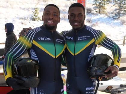 Joel Fearon (left) and Shane Pitter, members of Jamaica’s two-man bobsleigh team to the Winter Olympics.
