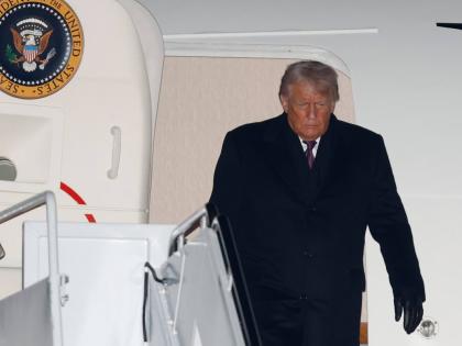 President Donald Trump arrives on Air Force One at Joint Base Andrews in the United States on January 22, 2026, after returning from the World Economic Forum in Davos.