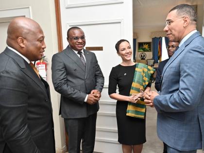 Prime Minister Dr Andrew Holness and Senator Kamina Johnson Smith, minister of foreign affairs and foreign trade, speak with Samuel Okudzeto Ablakwa (left), minister of foreign affairs of the Republic of Ghana, and his Ghana Deputy Minister/ Ministry of De