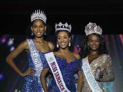 Miss Jamaica World Nevaeh Allen (centre) shares the spotlight with first runner-up, Asia Wright (right) who will wear the sash Miss International Jamaica; and Brianna Foster, second runner-up and holder of the title, Miss Earth Jamaica.