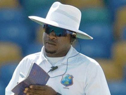 Umpire Leslie Riefer.