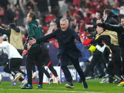 Benfica’s head coach Jose Mourinho (centre) celebrates at the end of a Champions League opening phase match between Benfica and Real Madrid, in Lisbon, Wednesday, January 28, 2026. 