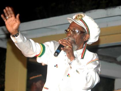 Bunny Wailer blesses the audience during his performance at a Bob Marley Birthday Bash at the MXIII Lawn in Negril in February 2009.
