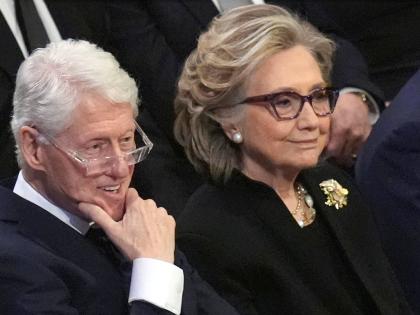 Former President Bill Clinton and former Secretary of State Hillary Clinton listen during the state funeral for former President Jimmy Carter at Washington National Cathedral in Washington, January 9, 2025. (AP Photo/Jacquelyn Martin, File)