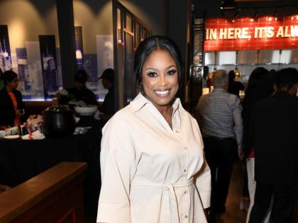 Chevell Powell, celebrity make-up artist, rocks a sleek two-piece set from local boutique Chik N Trende.