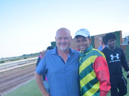 Winning trainer Anthony Nunes (left) and jockey Raddesh Roman in the winner’s enclosure after BARNABY won the Lloyd Linbergh ‘Lindy’ Delapenha Memorial  Trophy over a mile at Caymanas Park yesterday.