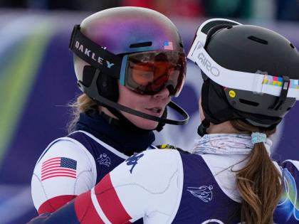 United States’ Mikaela Shiffrin (left) is hugged by United States’ Paula Moltzan at the finish area of an alpine ski, women’s team combined race, at the 2026 Winter Olympics, in Cortina d’Ampezzo, Italy, yesterday.