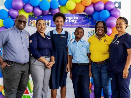 It was all smiles from Christel House Jamaica’s grade seven students (centre) after their Career Day session, discovering careers in science, technology, engineering, arts, and mathematics (S.T.E.A.M.) in the poultry industry. They are joined by the sess