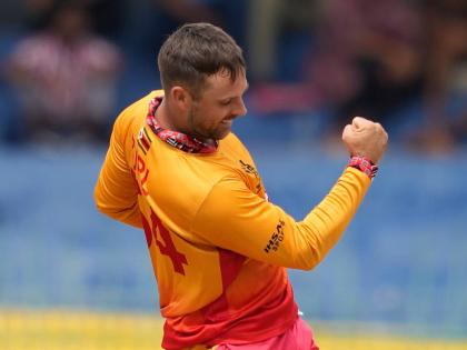 Zimbabwe's Ryan Burl celebrates the wicket of Australia's Glenn Maxwell during the T20 World Cup cricket match between Australia and Zimbabwe in Colombo, Sri Lanka on February 13, 2026. 