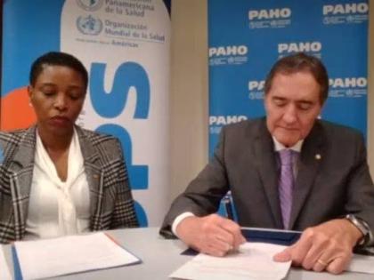 Dr Jarbas Barbosa (right), PAHO Director, signs the Framework Agreement as Dr Rhonda Sealey-Thomas, PAHO assistant director witnesses, on February 13, 2026.