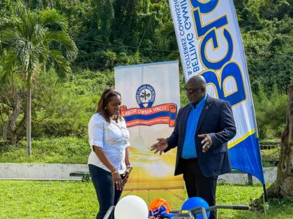 Electrified - that’s the word and all that is captured here with Roger Clarke High principal George Lewis showing appreciation in receiving a generator donated from the Betting Gaming and Lotteries Commission (BGLC) through their Corporate Affairs and Co