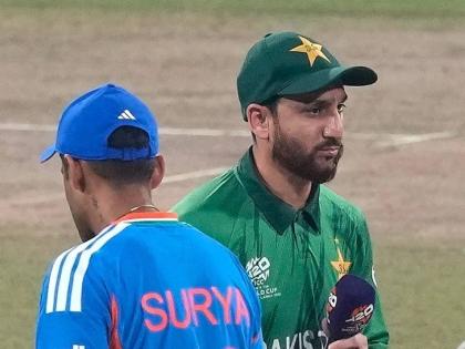 India’s captain Suryakumar Yadav (left)  and Pakistan’s captain Salman Ali Agha walk past each other after the coin toss of the T20 World Cup cricket match between India and Pakistan in Colombo, Sri Lanka, yesterday.