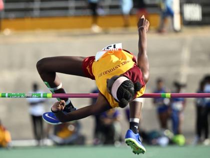 Port Antonio High School’s Cavel Wesley clears the high jump bar on her way to an Eastern Athletics Championships Class 3 record, 1.60 metres, at the National Stadium yesterday.
