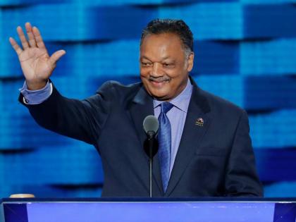  Reverend Jesse Jackson waves as he steps to the podium during the third day of the Democratic National Convention in Philadelphia on July 27, 2016. 