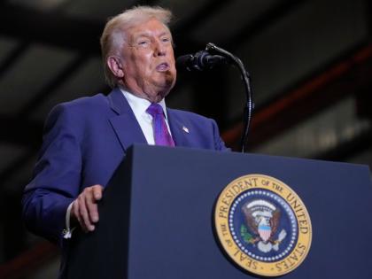 President Donald Trump speaks at Coosa Steel Corporation in Rome, Ga., Thursday, February 19, 2026. (AP Photo/Mark Schiefelbein)