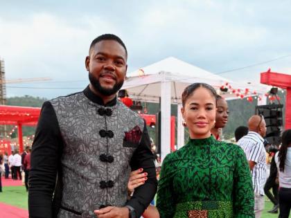 Pairing up for a quick photo are Mayor of Montego Bay Richard Vernon and Stacey Silvera, embracing the theme in Asian-inspired designs.