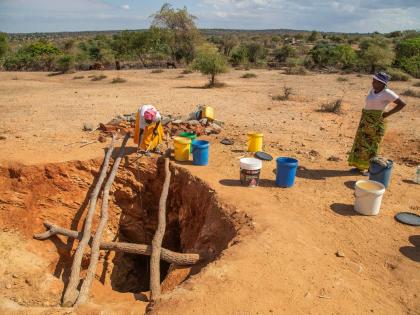 Villagers fetch water from a makeshift borehole in Mudzi, Zimbabwe, in 2024. as the United Nations' food agency says months of drought in southern Africa, triggered by the El Niño weather phenomenon, has had a devastating impact on more than 27 million pe