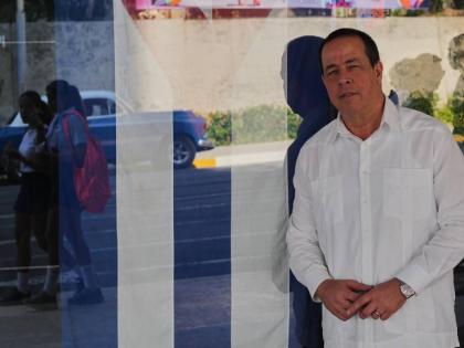 Cuba's Minister of Health, José Ángel Portal Miranda, poses at the ministry's entrance in Havana, Friday, February 20, 2026. (AP Photo/Ramon Espinosa)