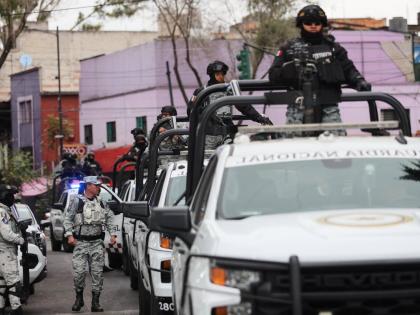 National Guards patrol the area outside of the General Prosecutor's headquarters in Mexico City, Sunday, February 22, 2026, after authorities reported that the Mexican Army killed Jalisco New Generation Cartel leader Nemesio Oseguera, known as "El Mencho."