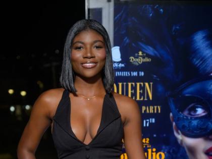 Tianna Chandler, marketing intern, Red Stripe, strikes a pose for the camera.