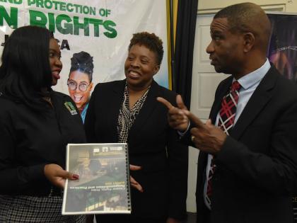 Mickel Jackson (left), executive director of Jamaicans for Justice (JFJ), in discussion with Assistant Commissioner of Police Jacqueline Coombs (centre), and Dr Ashburn Pinnock, president of The Mico University College at the unveiling of the JFJ’s ‘Ci
