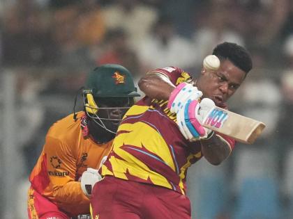 West Indies’ Shimron Hetmyer hits a six during the T20 World Cup match against Zimbabwe in Mumbai, India, yesterday.