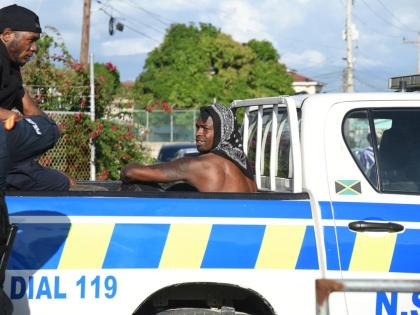 Footballer Cory Burke in police custody in January 2026.