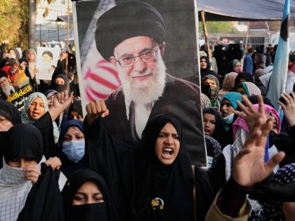 Shiite Muslims chant anti-US slogans during a rally to condemn the killing of Iranian Supreme Leader Ayatollah Ali Khamenei, in Lahore, Pakistan, on Sunday, March 1, 2026. 