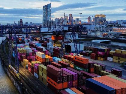 Containers are stored in a cargo terminal in Frankfurt, Germany, Monday, February 23, 2026. (AP Photo/Michael Probst)