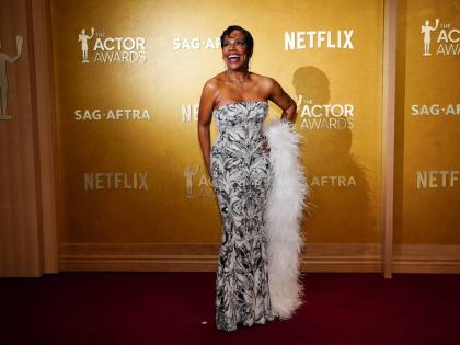 Styled by her daughter and longtime stylist, Ivy Coco Maurice, this year’s TIME Women of the Year honouree Sheryl Lee Ralph poses on the red carpet at Sunday’s Actor Awards . 