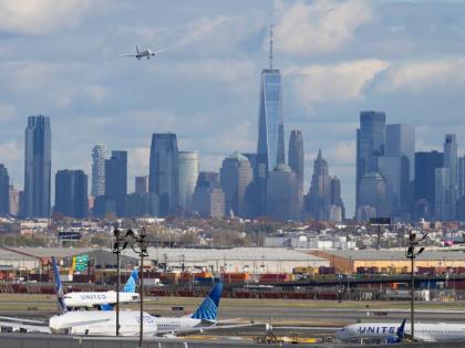 The New York City skyline with a plane approaching an airport on November 6, 2025.  AP 