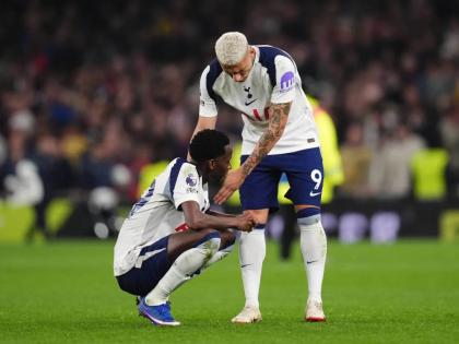  Tottenham Hotspur’s Pape Matar Sarr (left) and Richarlison react after the English Premier League against Crystal Palace in London yesterday.