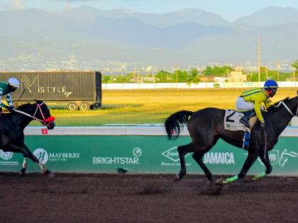 NEO STAR (right), ridden by Tajay Suckoo, wins the second running of the nine-furlongs-and 25-yard International Women’s Day Trophy ahead of  DON KWESI at Caymanas Park on March 7.