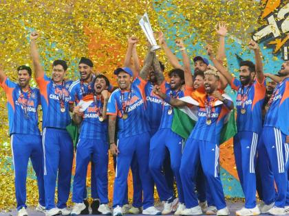 India’s players celebrate with the trophy after winning the T20 World Cup final match against New Zealand in Ahmedabad, India, on Sunday, March 8.  