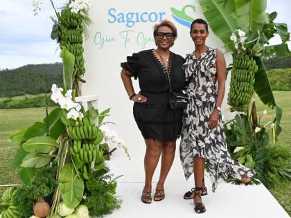 Julia Brown (left), chief executive officer of JMB Legacy Consulting, and Issia Madden, managing director of Design HQ, strike a pose at the Her Farm to Your Table Brunch held on Sunday.