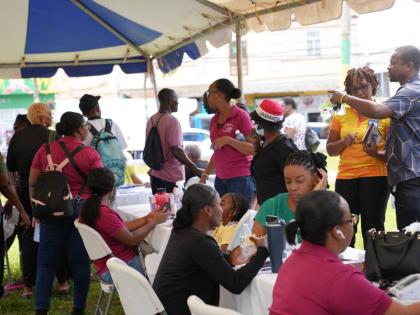 Scores of people take advantage of free health checks during activities at the health fair in Manchester.