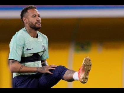 Brazil’s Neymar exercises during a training session at the Grand Hamad stadium, in Doha, Qatar on November 23, 2022. 