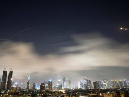 Israeli air defense system fires to intercept missiles during an Iranian attack over Tel Aviv, Israel, early Sunday, March 15.