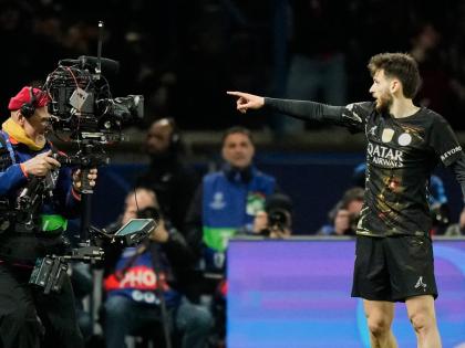 PSG’s Khvicha Kvaratskhelia celebrates after scoring his side’s fourth goal during the first leg of the Champions League round-of-16 match against Chelsea in Paris on Wednesday.