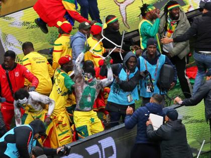 Senegal supporters protest after a controversial penalty was awarded to Morocco during the Africa Cup of Nations final soccer match between Senegal and Morocco on January 18, 2026, in Rabat, Morocco. (AP Photo/Youssef Loulidi, File)