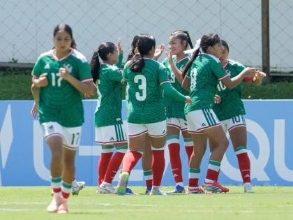 Mexico’s under-17 girls celebrate scoring a goal against Jamaica’s young Reggae Girlz in a the final round of Concacaf Women’s U17 Qualifiers at the Costa Rican Football Federation Field #2 in Alajuela, Costa Rica, yesterday.  