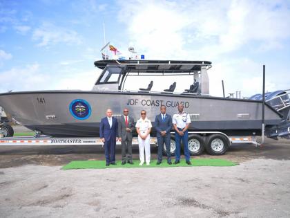 Chief of Defence Staff, Vice Admiral Antonette Wemyss-Gorman (centre), shares a photo opportunity with (from left) Senior Vice President, Metal Shark, Henry Irizarry; Permanent Secretary in the Office of the Prime Minister, Ambassador Rocky Meade; Commissi