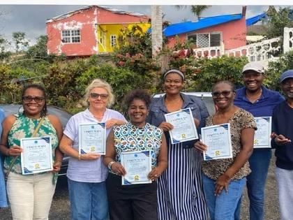 The Bogue Heights heroes gleefully displaying their certificates of appreciation.