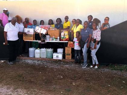 Members of the JN Circle Ocho Rios, Port Maria and Gayle chapters, along with the JN Circle Falmouth Chapter, pause for a group photo after presenting donations to Noah’s Ark Children’s Home and the Falmouth Infirmary in Falmouth. The contributions inc